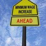 Sign that reads minimum wage